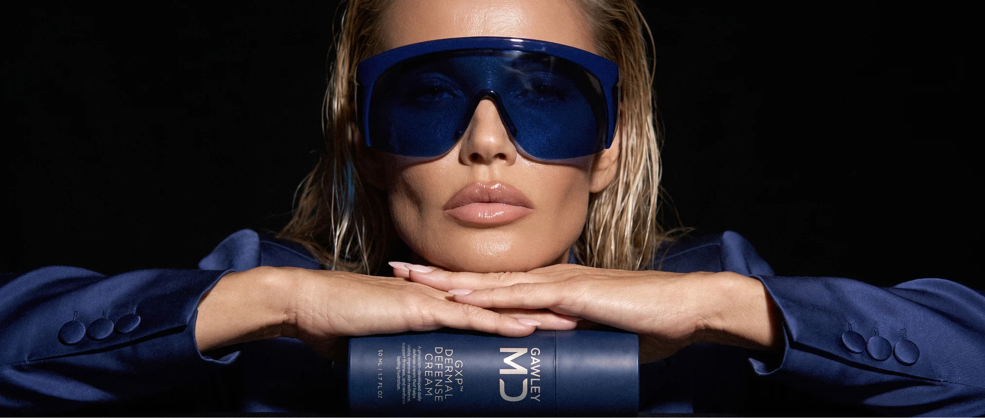 Model wearing blue sunglasses with Gawley MD